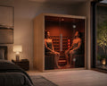 Luxury Lumin Three infrared sauna in a modern bedroom wellness retreat with warm red light therapy glow and relaxing spa-inspired interior design.