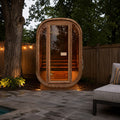 Auris One outdoor cedar sauna beside a luxury backyard pool, creating a private spa-inspired wellness retreat for year-round relaxation.
