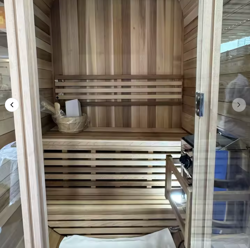 Interior cedar bench seating inside the Auris One outdoor sauna