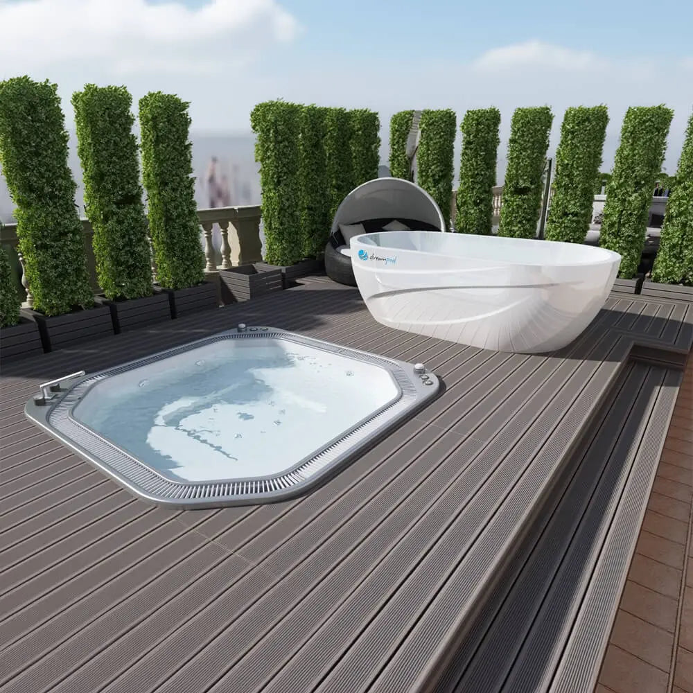 Dreampod Ice Bath cold plunge on a patio beside a hot tub