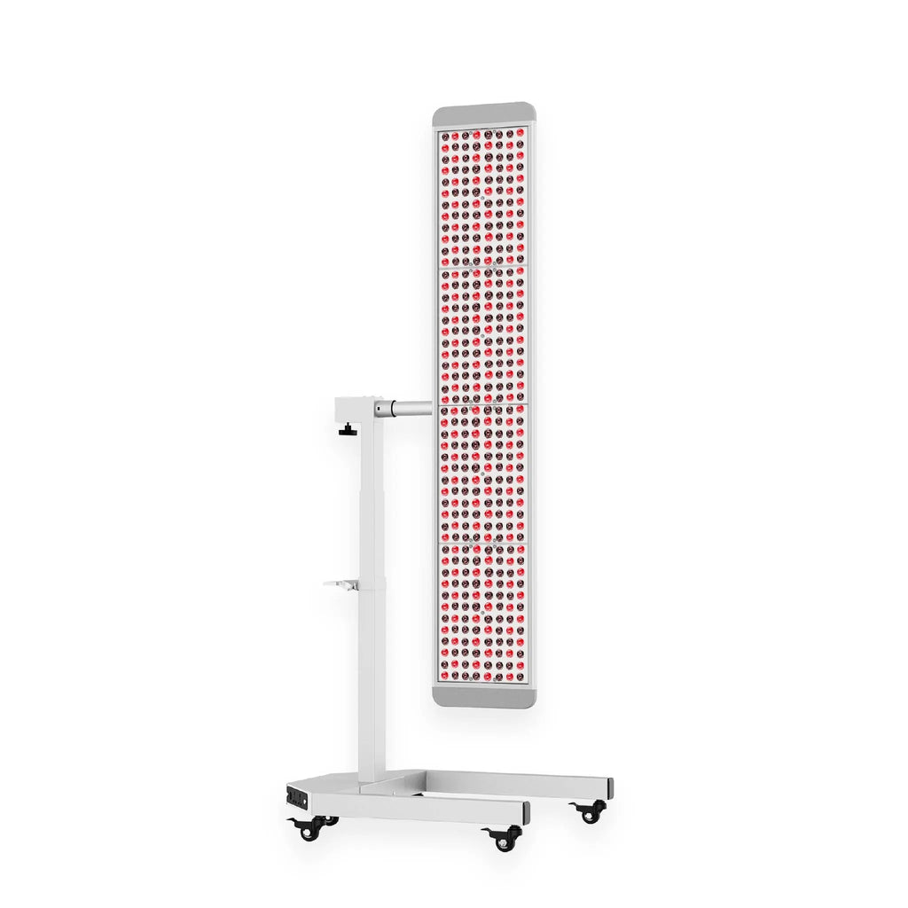 Helio Blaze full-body red light therapy panel mounted on a height-adjustable electric stand.