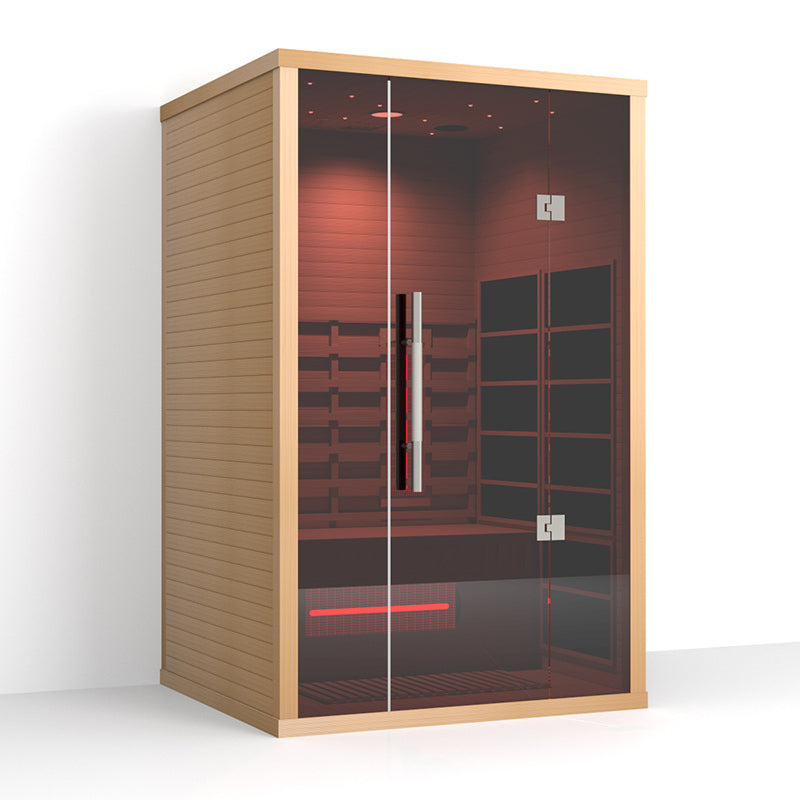 Infrared sauna with wooden exterior and glass door on a white background