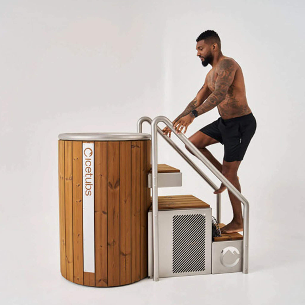 Icetubs IceBarrel thermowood cold plunge tub with chiller, stairs, and handrails for safe entry and recovery.