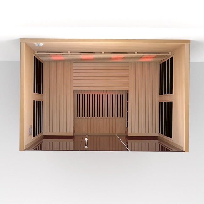 Interior bench seating inside the Lumin Three infrared sauna with warm therapeutic lighting and natural wood finish.