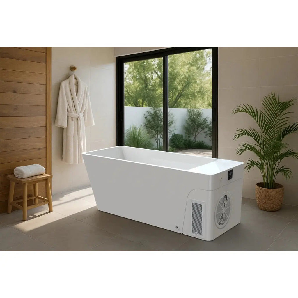 The white Orivon Frost cold plunge tub with integrated chiller in a bright, plant-filled bathroom.