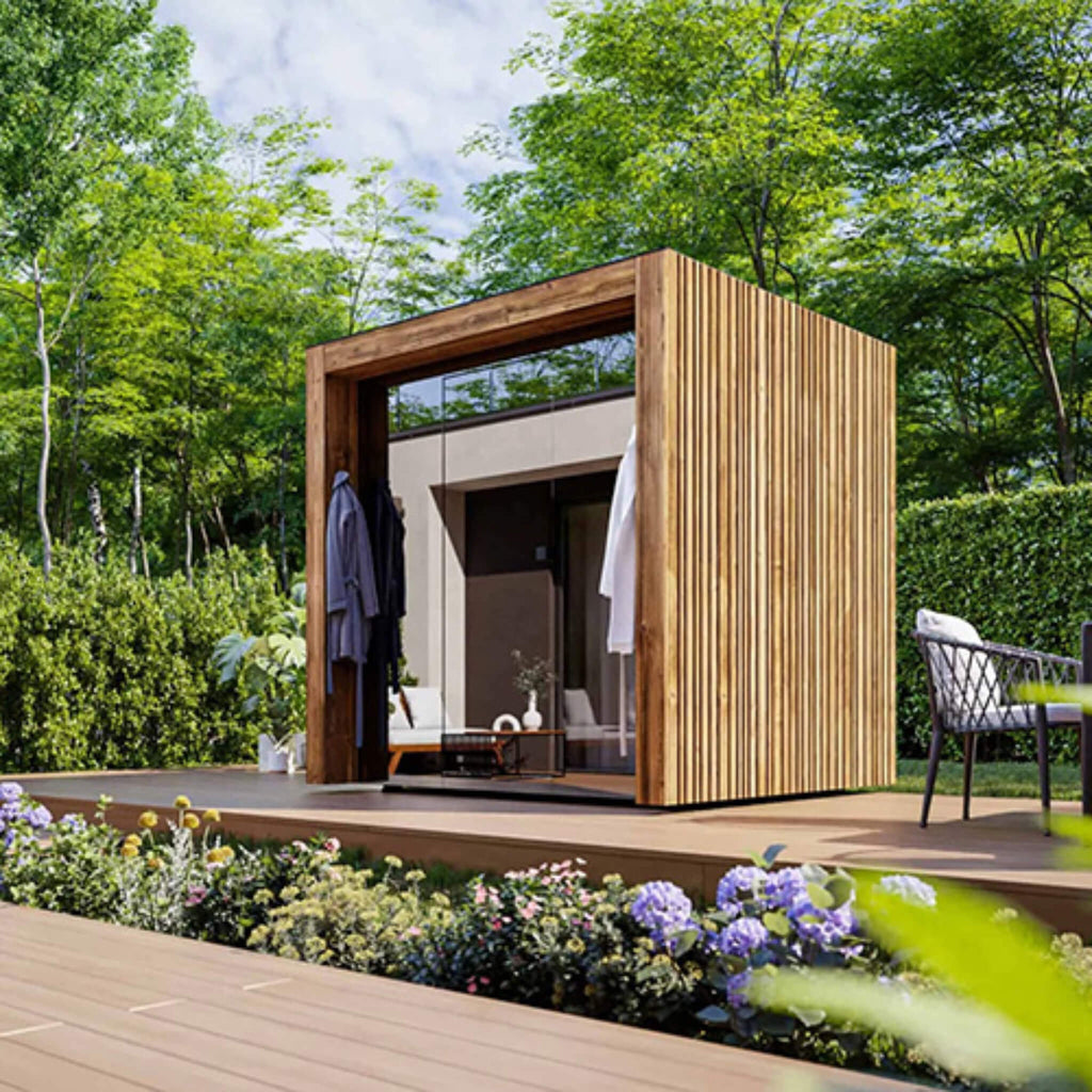 ThermaSol Fortis outdoor glass-front sauna cabin in a garden setting