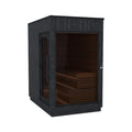 Small ThermaSol Nordic Misty outdoor sauna cabin, electric model with left-side glass door and tinted corner window.