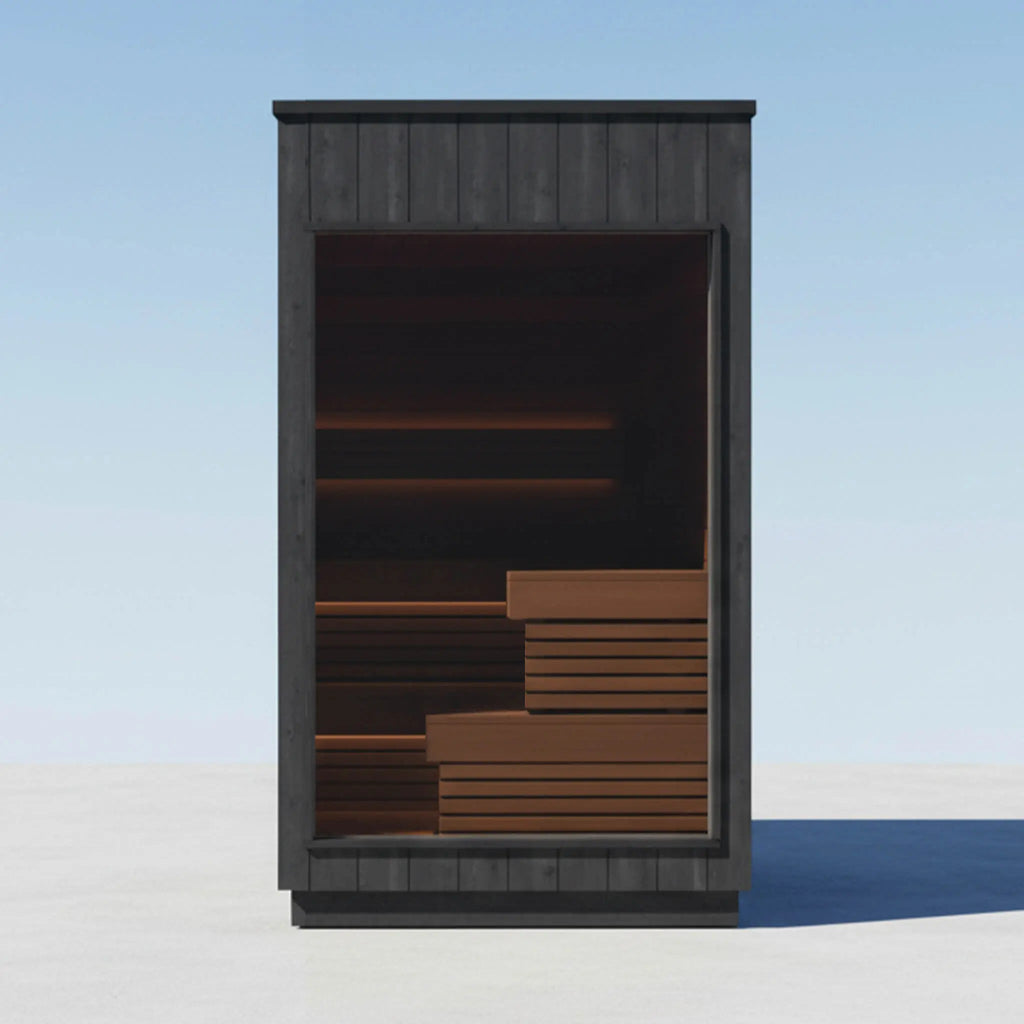 ThermaSol Nordic Misty outdoor sauna cabin viewed from the front, its glass door revealing tiered wood benches inside.