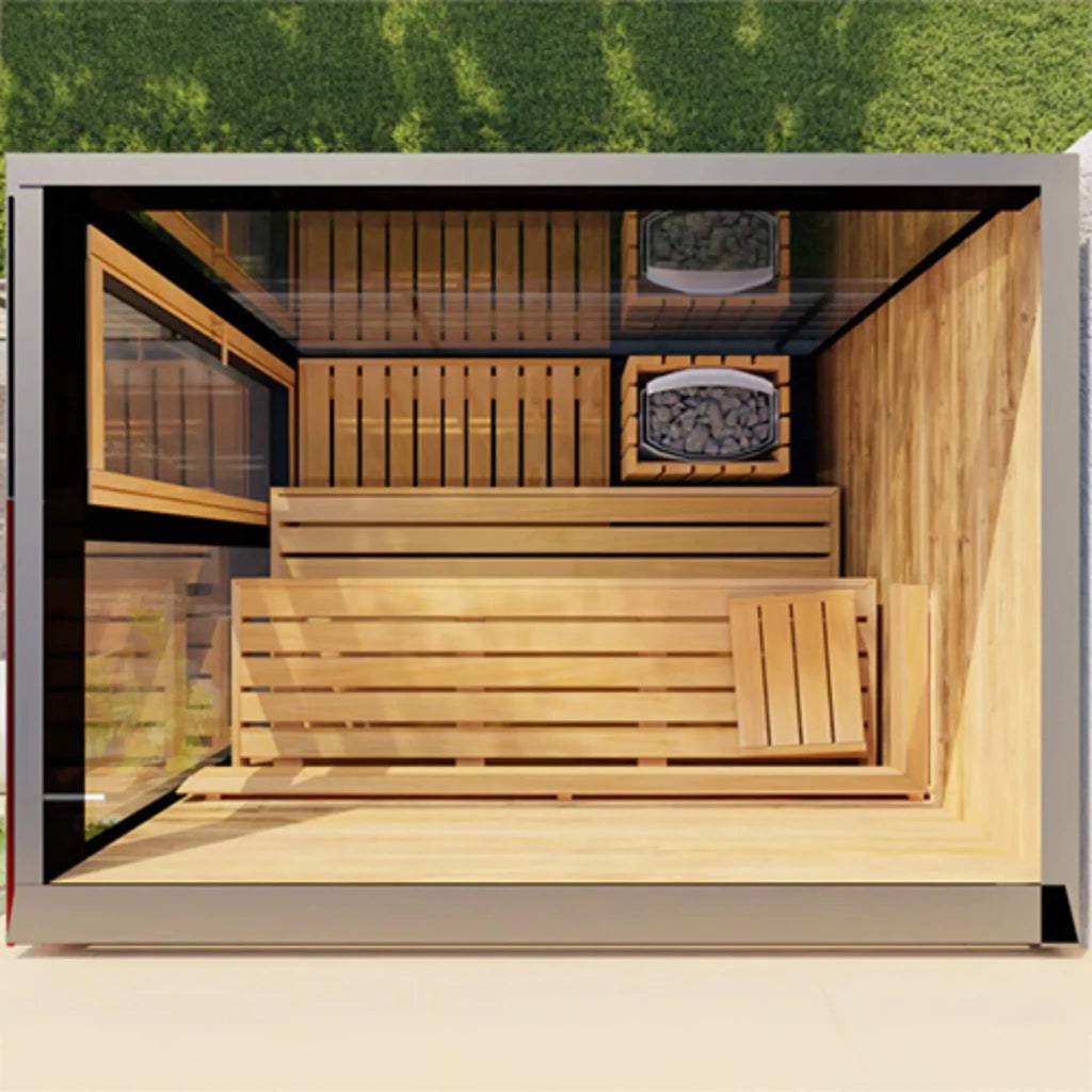 Overhead view into the ThermaSol Vera outdoor sauna cabin showing tiered benches and stone-filled heaters from above.